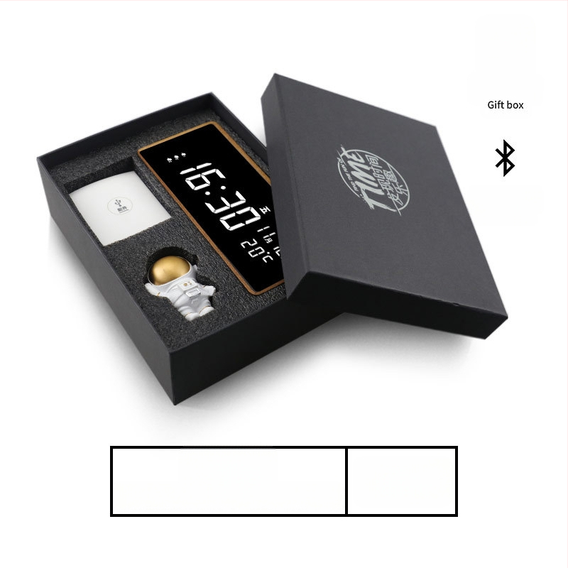 Mormon äratuskell, tammest korpus, LED-numbriline display, akudega toidetav elektrooniline liikumine, termomeeter ja nädalapäeva kuvamine