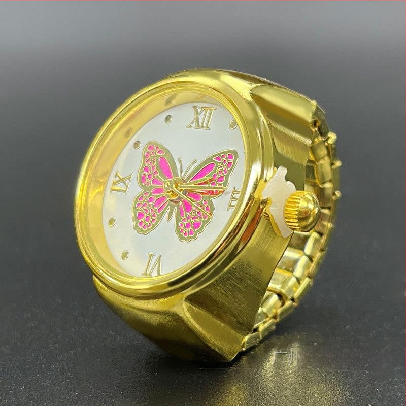 Žiedinis laikrodis – Kvarcinis SL68 mechanizmas; Nerūdijančio plieno dirželis; Korpusas: lydinys; Vandens atsparumas: Nėra atsparumo vandeniui