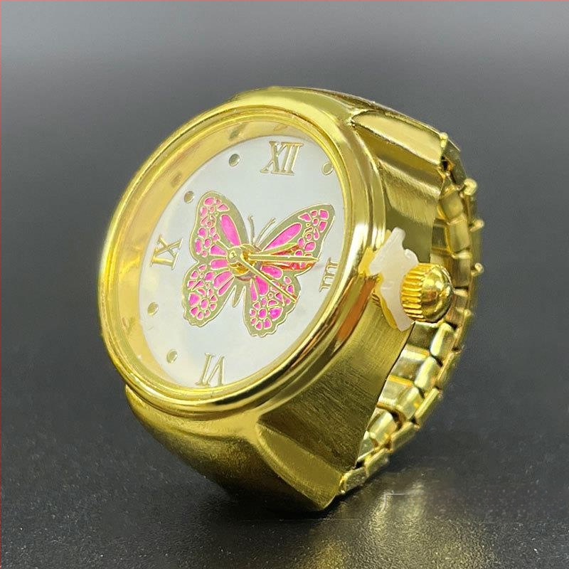 Žiedinis laikrodis – Kvarcinis SL68 mechanizmas; Nerūdijančio plieno dirželis; Korpusas: lydinys; Vandens atsparumas: Nėra atsparumo vandeniui