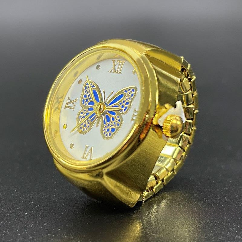 Žiedinis laikrodis – Kvarcinis SL68 mechanizmas; Nerūdijančio plieno dirželis; Korpusas: lydinys; Vandens atsparumas: Nėra atsparumo vandeniui