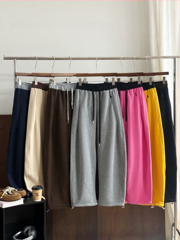 Naiste fleece-kattega puuvillast‑polüestrist sportpüksid, keskosa vöökoht, vaba sirge lõige, paksendatud talveks