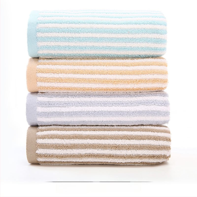 Σετ τεσσάρων πετσέτων από 100% βαμβάκι για πρόσωπο και σώμα — μαλακές, απορροφητικές, με αυξημένη πυκνότητα