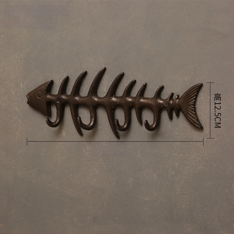 Kalapács alakú falidísz öntöttvasból, beltéri dekoráció