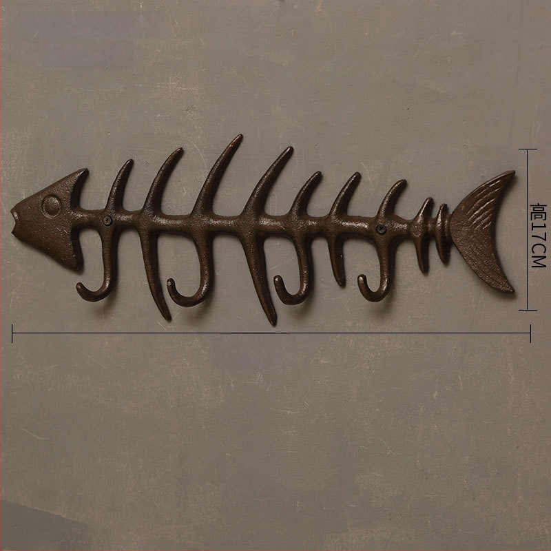 Kalapács alakú falidísz öntöttvasból, beltéri dekoráció