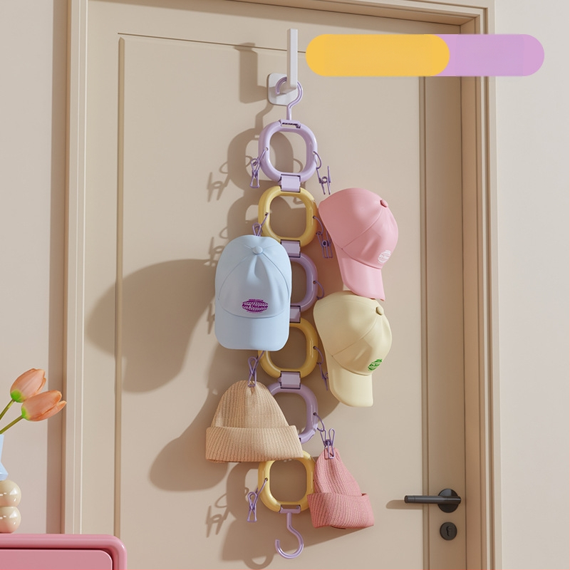 Cepuru turētājs ar klipu - plastmasas, saliekams, modelis 1, zīmols Orange Words