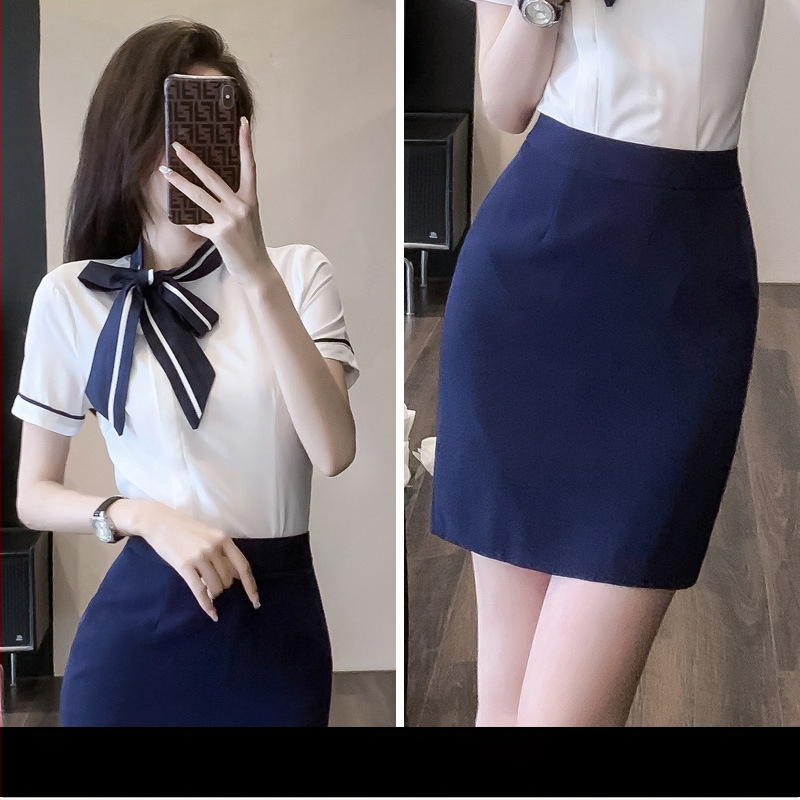 OL uniformas komplekts: blūze ar īsu svārku, regulāras piedurknes, 3/4 garuma piedurknes, OL commuter stilā, poliesteru maisījums 30–50%, pavasaris 2024