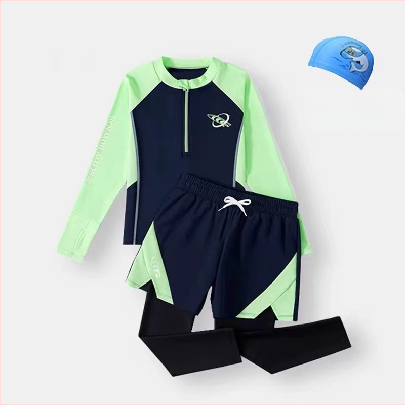 Berniukų dviejų dalių plaukimo komplektas su ilgomis rankovėmis ir ilgomis kelnių, saulės apsauga — poliesterio audinys 85%, poliesterio pamušalas 85%, svoris 150–300 g/m², plaukimui