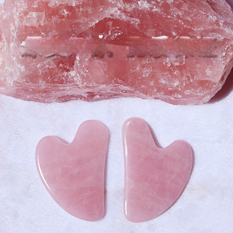 Širdies formos gua sha plokštė iš miltelinio kristalo veido masažui