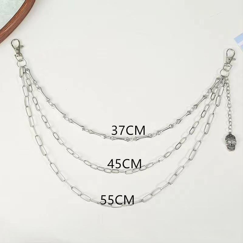 Metāla jostas ķēde biksēm, pank stila ar ģeometrisku slāņošanu un kraniuma motīvu (Materiāls: metāls; Kategorija: jostas ķēde; Sezona: 2025. rudens; Pielāgošana pieejama)