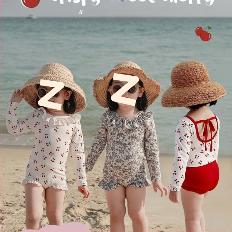 Mergaitėms: atviros nugaros viengabalis maudymosi kostiumėlis, karikatūrų raštas, amžius 0-8 metų, audinys: nailonas su elastanu