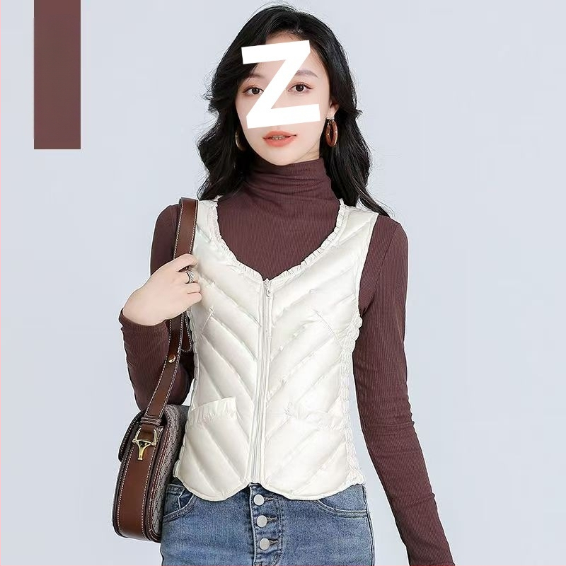 Sieviešu ultra īsa dūnu veste, bez piedurknēm, pildījums baltais pīļu dūns 81–85%