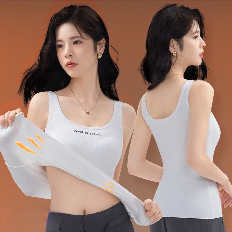 Sievietēm Ginger Essence Heattech term vestē ar iebūvētiem krūšu spilventiem, divpusēja pūkaina iekšiene, piemērota gan iekšējai, gan ārējai valkāšanai, svars 181–200 g/m2