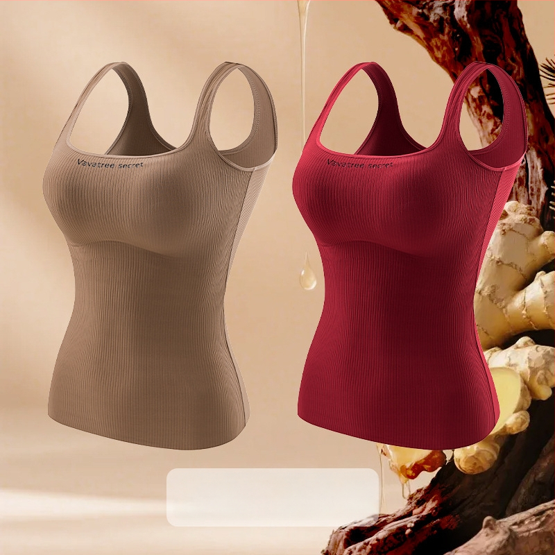 Sievietēm Ginger Essence Heattech term vestē ar iebūvētiem krūšu spilventiem, divpusēja pūkaina iekšiene, piemērota gan iekšējai, gan ārējai valkāšanai, svars 181–200 g/m2