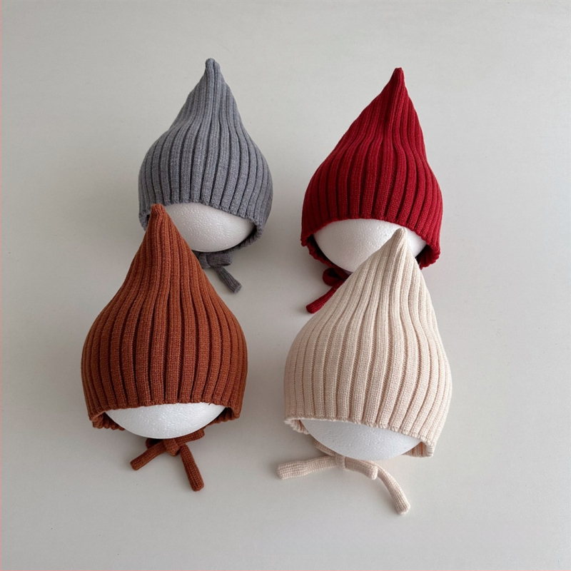 Adīta bērnu cepure ar smailu virsu un aizsargājošu siksnu, auss aizsardzība; silta un vēja izturīga ziemas cepure 6–12 mēnešiem