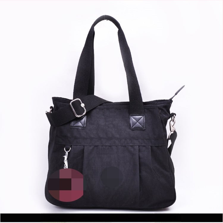 Õla kott crossbody – nailon, horisontaalne ruudu kuju, tõmblukukatte avamine, sisetaskud: tõmblukutasku, telefonitasku, ID-tasku, laminaat-tõmbluktasku, kaamera-tasku, vooder nailon