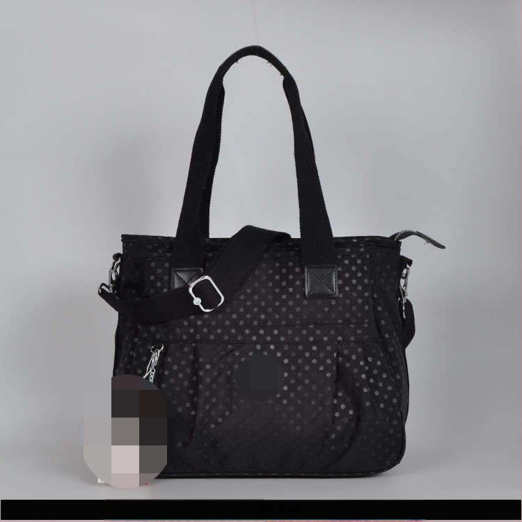 Õla kott crossbody – nailon, horisontaalne ruudu kuju, tõmblukukatte avamine, sisetaskud: tõmblukutasku, telefonitasku, ID-tasku, laminaat-tõmbluktasku, kaamera-tasku, vooder nailon