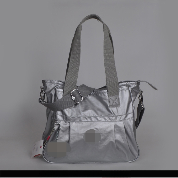 Õla kott crossbody – nailon, horisontaalne ruudu kuju, tõmblukukatte avamine, sisetaskud: tõmblukutasku, telefonitasku, ID-tasku, laminaat-tõmbluktasku, kaamera-tasku, vooder nailon