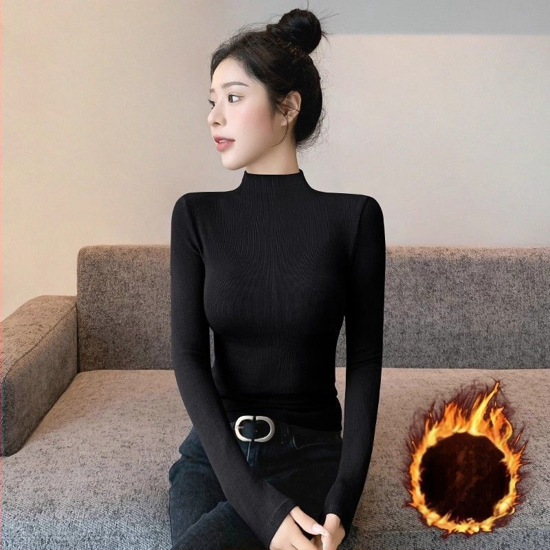 Oversized bez piedurknēm adīts tops ar pusi augstu kaklu un izšuvumu uz gludas auduma, pavasaris 2025