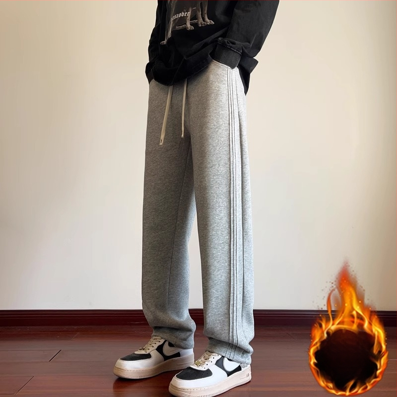 Pusaudžu sporta ikdienas bikses, brīvs piegriezums, vidukļa vidējais līmenis, šņorēta aizdare, kokvilnas audums