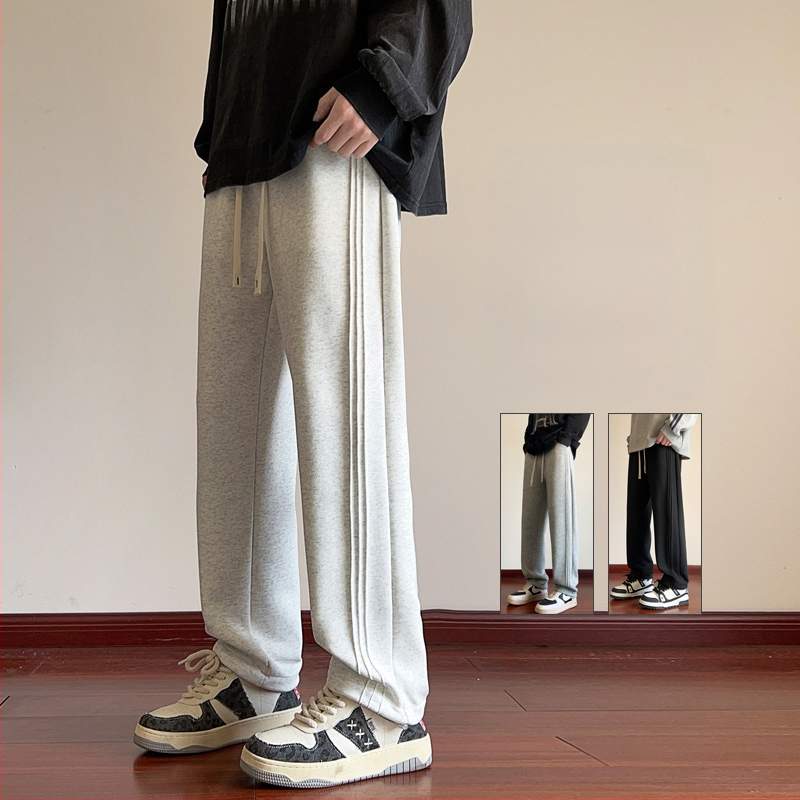 Pusaudžu sporta ikdienas bikses, brīvs piegriezums, vidukļa vidējais līmenis, šņorēta aizdare, kokvilnas audums