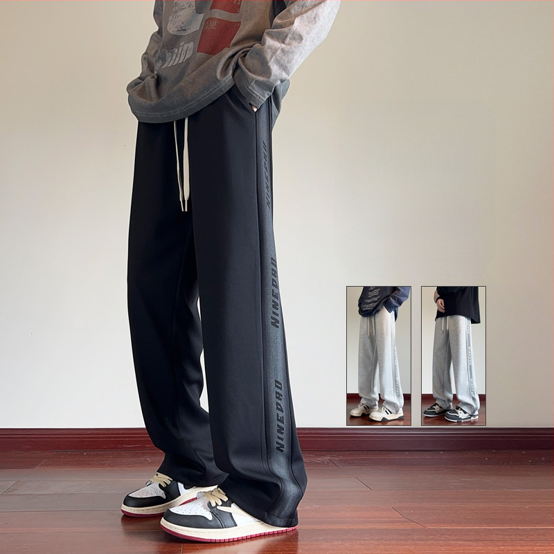 Pusaudžu sporta ikdienas bikses, brīvs piegriezums, vidukļa vidējais līmenis, šņorēta aizdare, kokvilnas audums