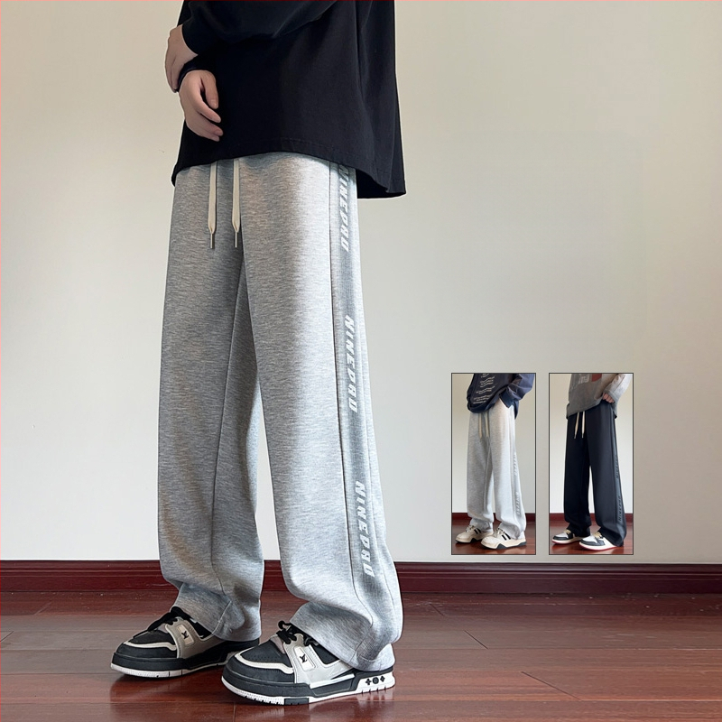 Pusaudžu sporta ikdienas bikses, brīvs piegriezums, vidukļa vidējais līmenis, šņorēta aizdare, kokvilnas audums