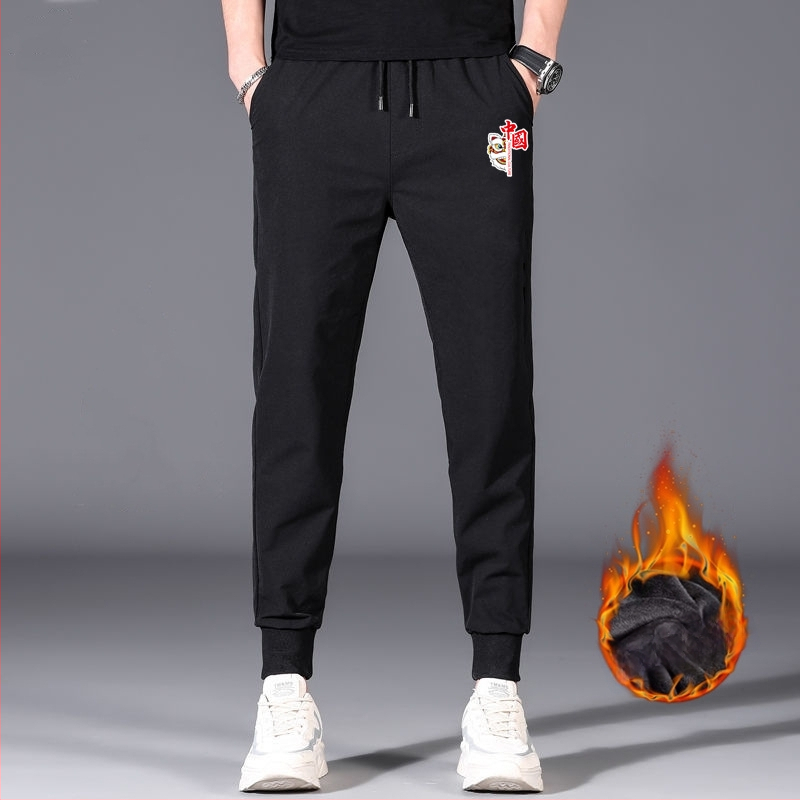 Flīša pildītas darba bikses ar brīvu piegriezumu, potītei aizsiets auklu, poliesteru audums