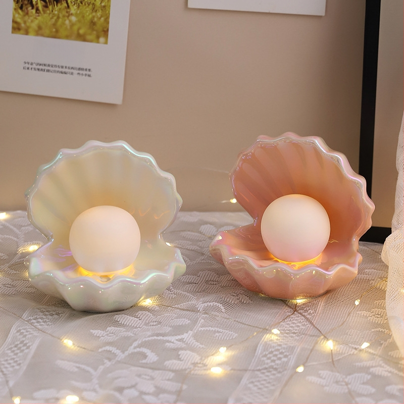 Xuanyi keramikas čaurlokiem formas nakts gaisma un rotaslietu uzglabāšanas trauks — moderns roku darbs galda dekors