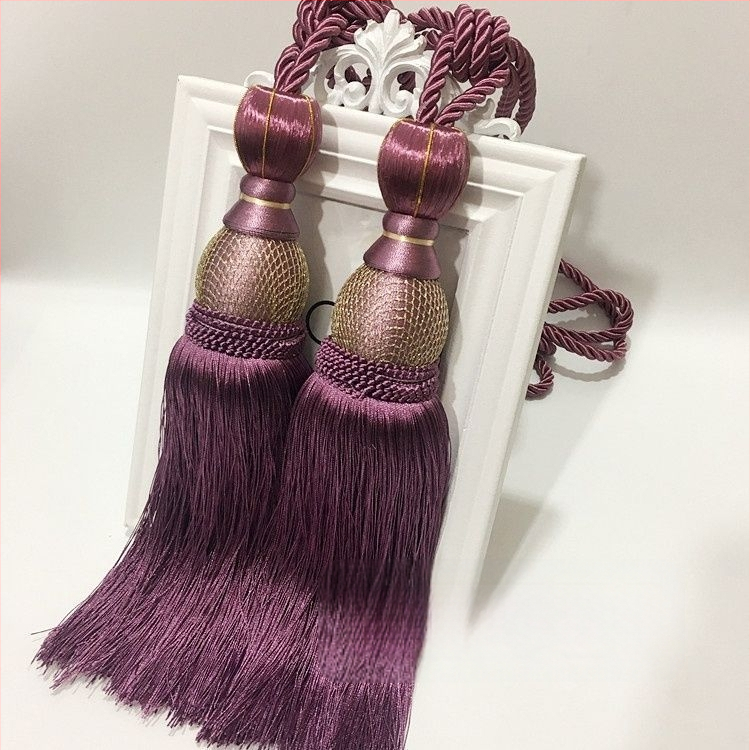 Aizkaru aukli - zelta stieples bumbiņa ar pušķi (audums)