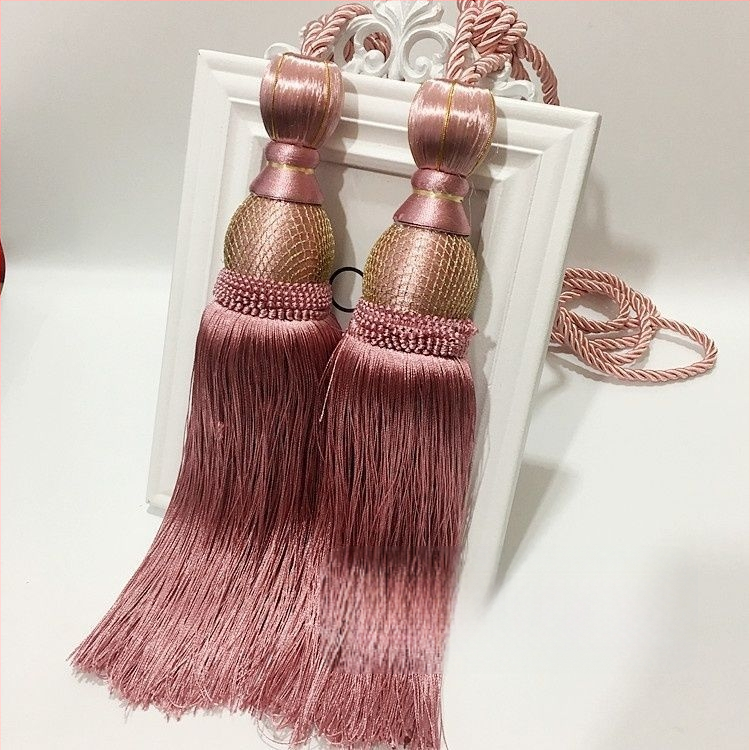 Aizkaru aukli - zelta stieples bumbiņa ar pušķi (audums)