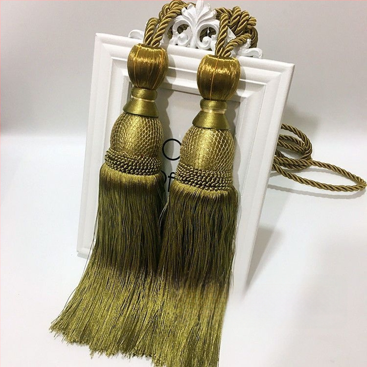 Aizkaru aukli - zelta stieples bumbiņa ar pušķi (audums)