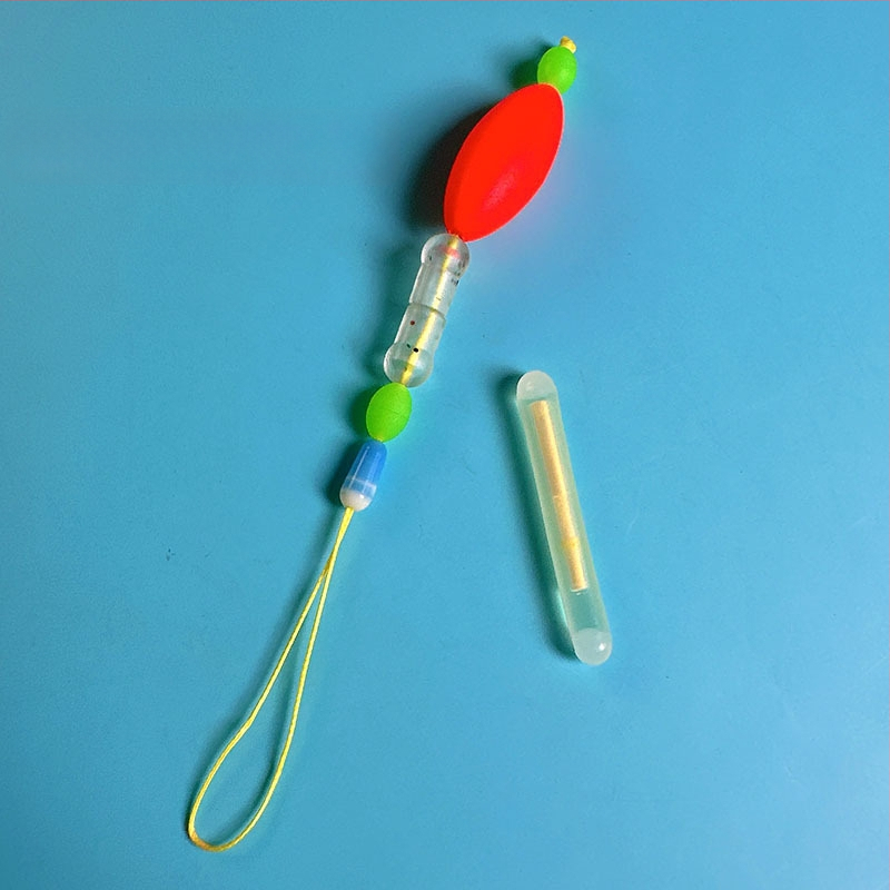 Makšķerēšanas līnijas piederums ar pastiprinošu stieni, luminescējošu pērlīti un galvenās līnijas savienotāju