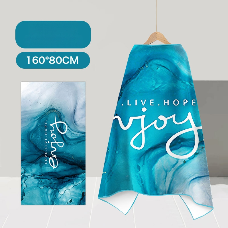 Nēsājamais mikroviļņu dvieļu pludmales pončo – ātri žūst, viegls, ar pogu kapuci; Materiāls: mikrofibra; Svars zem 100 g; Diegs: 150D; Jacquard aušana