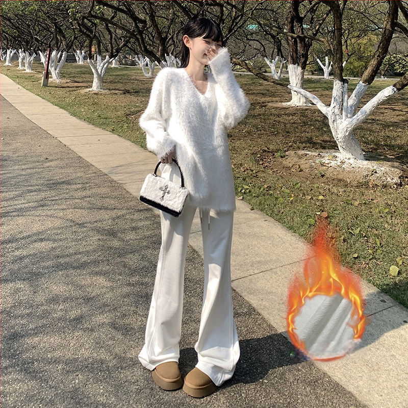 Moteriškos sportinės kelnės su švelniai išsiplėšiančiu kelniu, žieminis fliso pamušalas, žemas juosmuo, ilgos iki grindų, poliesterio–medvilnės mišinys