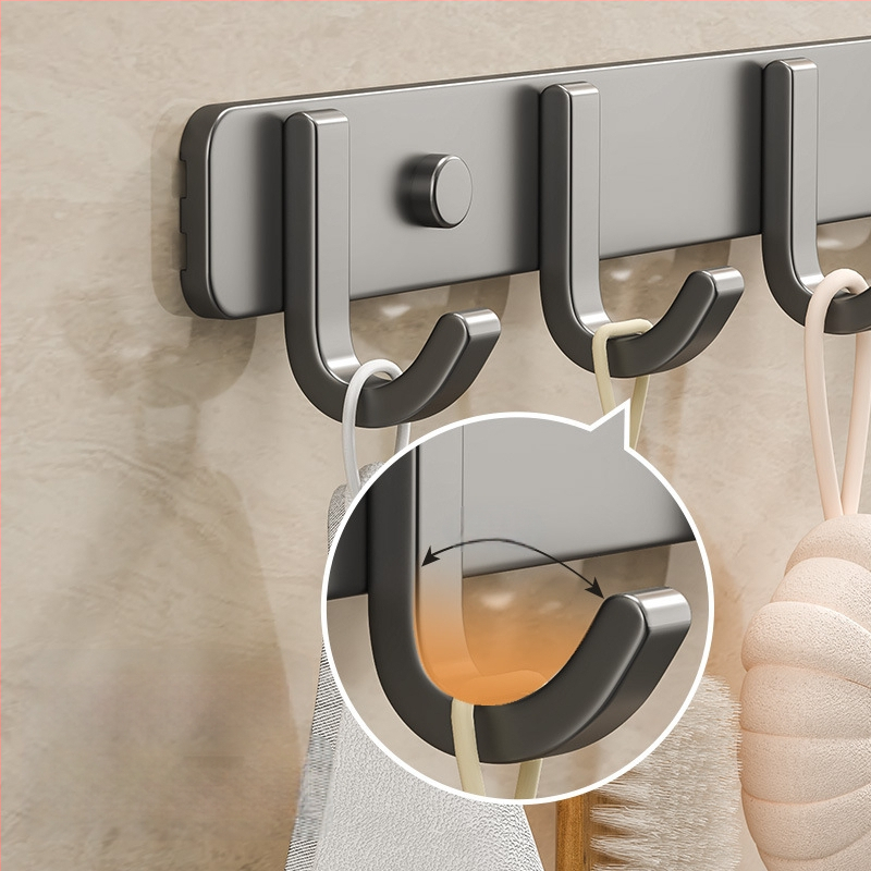 Sieninis lipnus kabykla iš kosminio aliuminio, kelių eilių kabliukų, be gręžimo, apkrova 5–10 kg, šiuolaikinis minimalistinis dizainas.