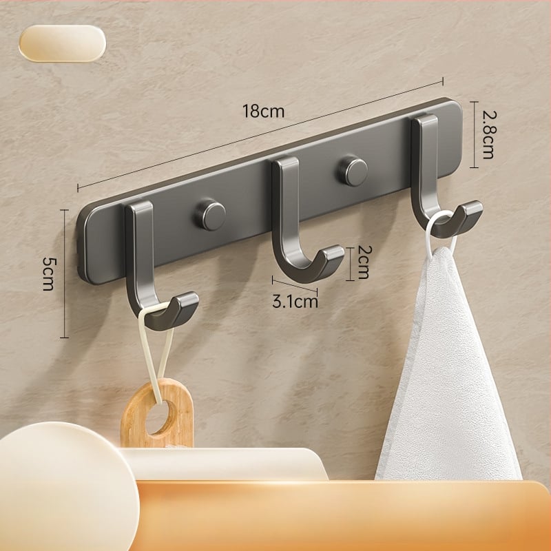 Sieninis lipnus kabykla iš kosminio aliuminio, kelių eilių kabliukų, be gręžimo, apkrova 5–10 kg, šiuolaikinis minimalistinis dizainas.