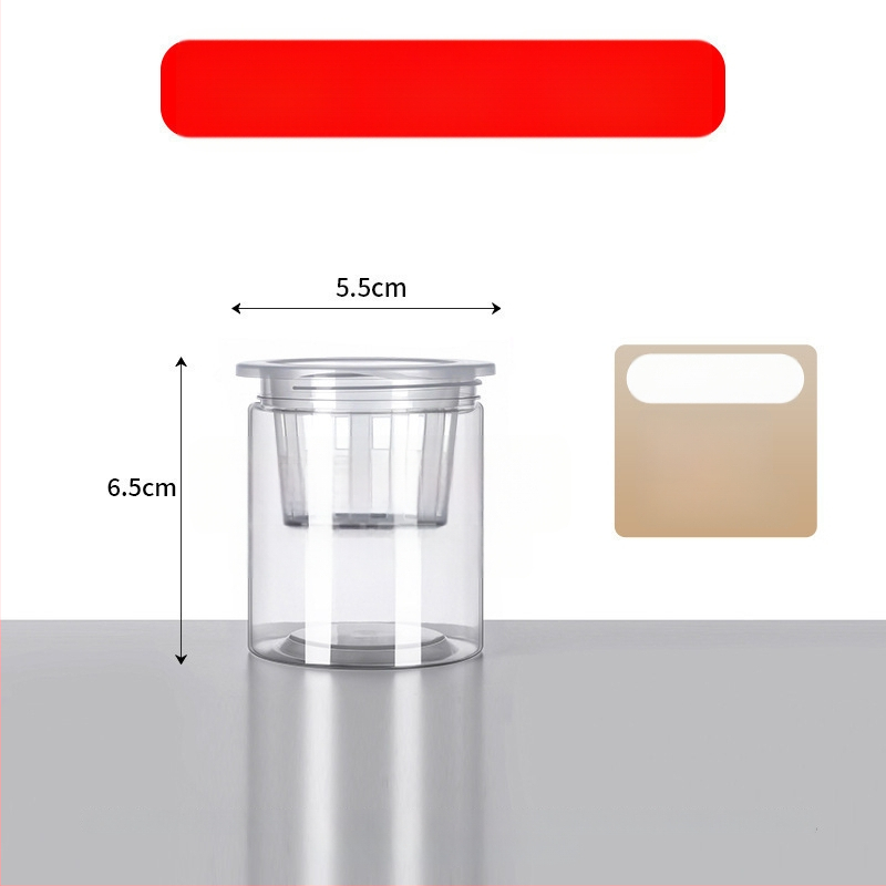 Caurspīdīgs plastmasas cilindrisks hydroponiskais pods sēklām un maziem augiem, stāvošs uz grīdas ar stādīšanas grozu, domāts mājas un dārza lietošanai