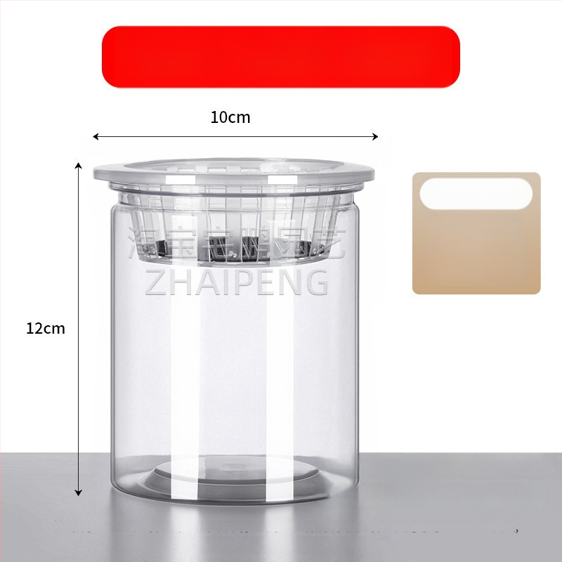 Caurspīdīgs plastmasas cilindrisks hydroponiskais pods sēklām un maziem augiem, stāvošs uz grīdas ar stādīšanas grozu, domāts mājas un dārza lietošanai