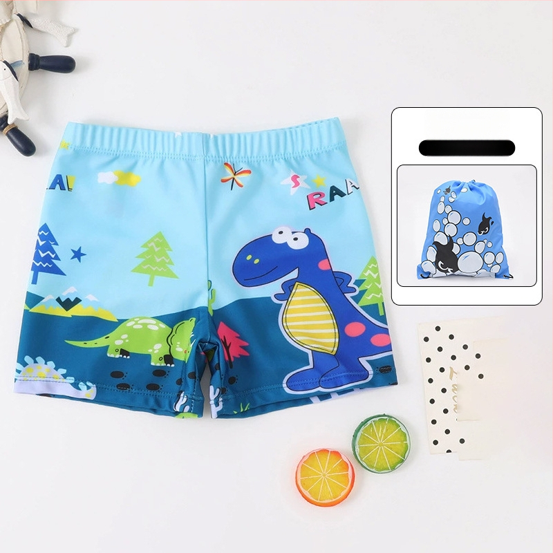 Vaikų plaukimo šortai su karikatūrų spauda, kvėpuojantys, greitai džiūstantys; audinys poliesteris 88%, vidinis pamušalas 12%