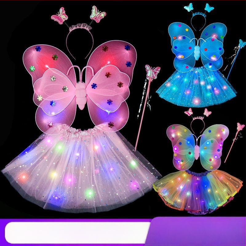 Mergaičių švytintys drugelių sparnai — audinys, animacinis stilius, sceninis rekvizitas