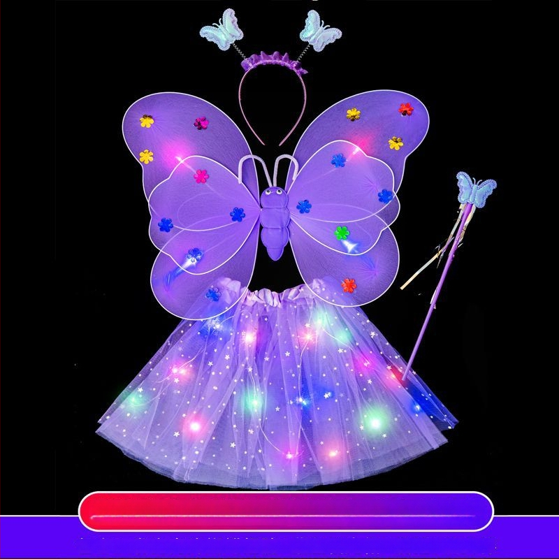 Mergaičių švytintys drugelių sparnai — audinys, animacinis stilius, sceninis rekvizitas