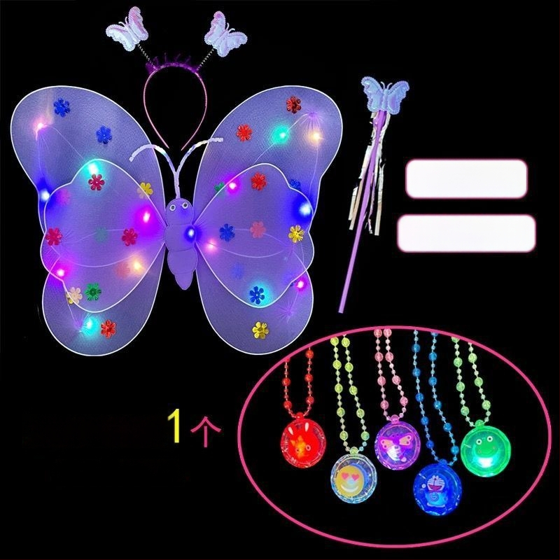 Mergaičių švytintys drugelių sparnai — audinys, animacinis stilius, sceninis rekvizitas