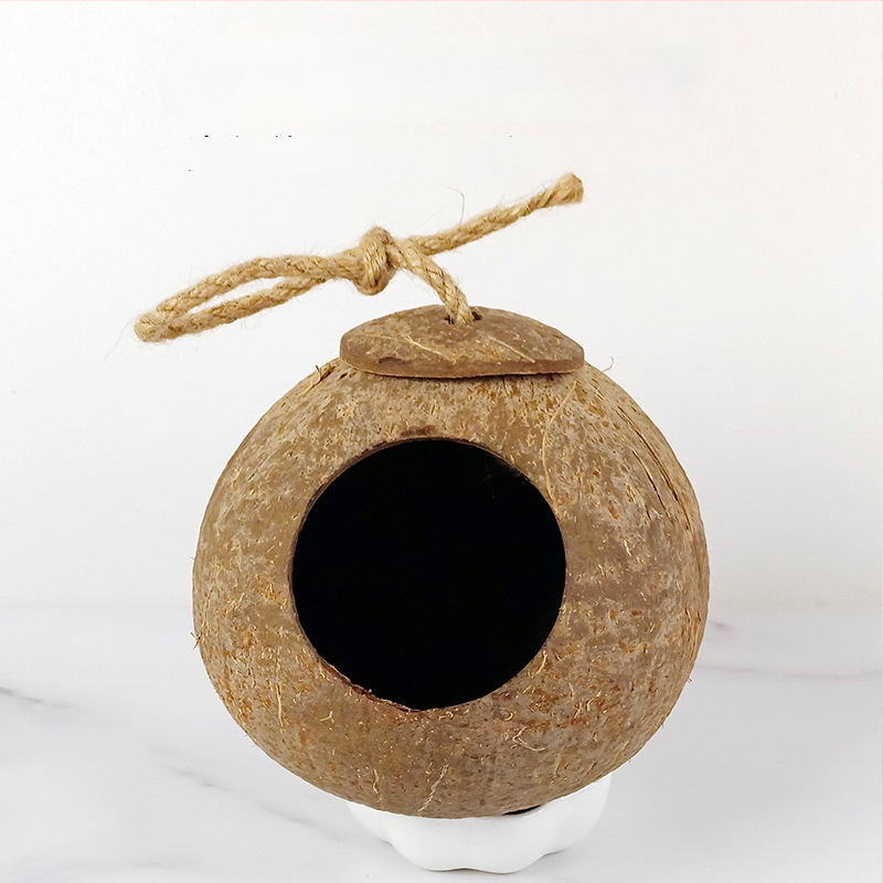 Kokoso lukšto paukščių lizdas papūgai su tigrinės odos motyvu ir mistiniu fenikso ornamentu – pyninėta šilta lizda