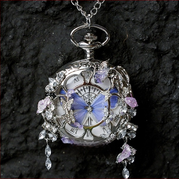 Liblika taskukell koos liikuva tegeliku liblika eksemplariga, ideaalne kingitus tüdrukutele ja sõbrannadele (Elektroniline mehhanism; veekindlus 35 m; silikoonkorpus; ümmargune kellapaneel; ABS klaas)