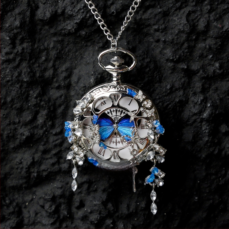 Liblika taskukell koos liikuva tegeliku liblika eksemplariga, ideaalne kingitus tüdrukutele ja sõbrannadele (Elektroniline mehhanism; veekindlus 35 m; silikoonkorpus; ümmargune kellapaneel; ABS klaas)