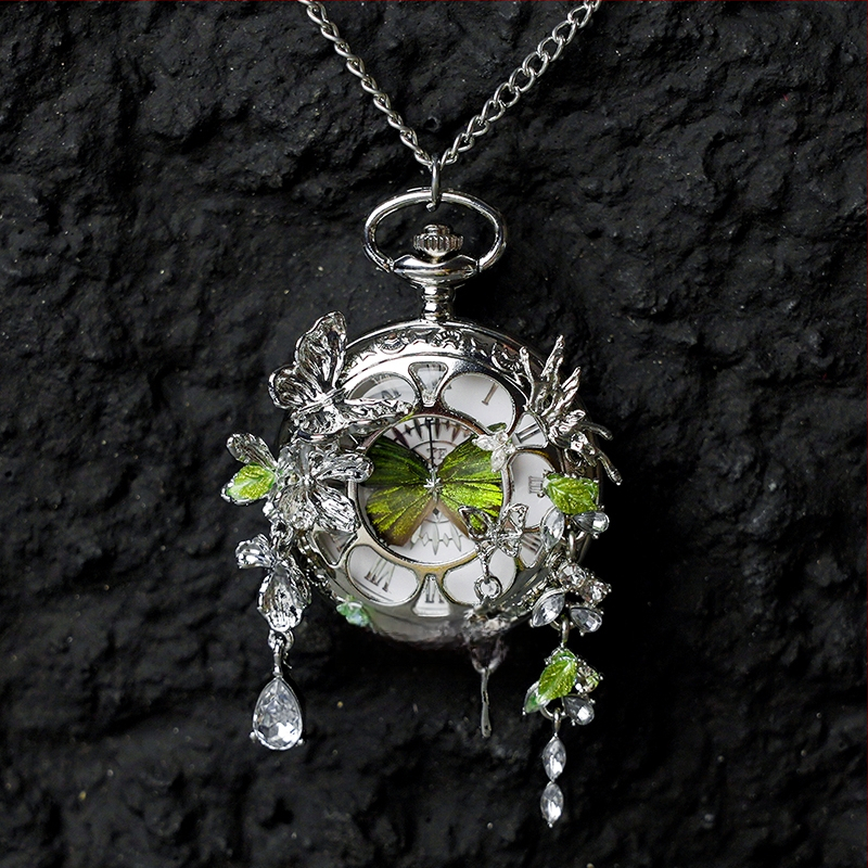 Liblika taskukell koos liikuva tegeliku liblika eksemplariga, ideaalne kingitus tüdrukutele ja sõbrannadele (Elektroniline mehhanism; veekindlus 35 m; silikoonkorpus; ümmargune kellapaneel; ABS klaas)