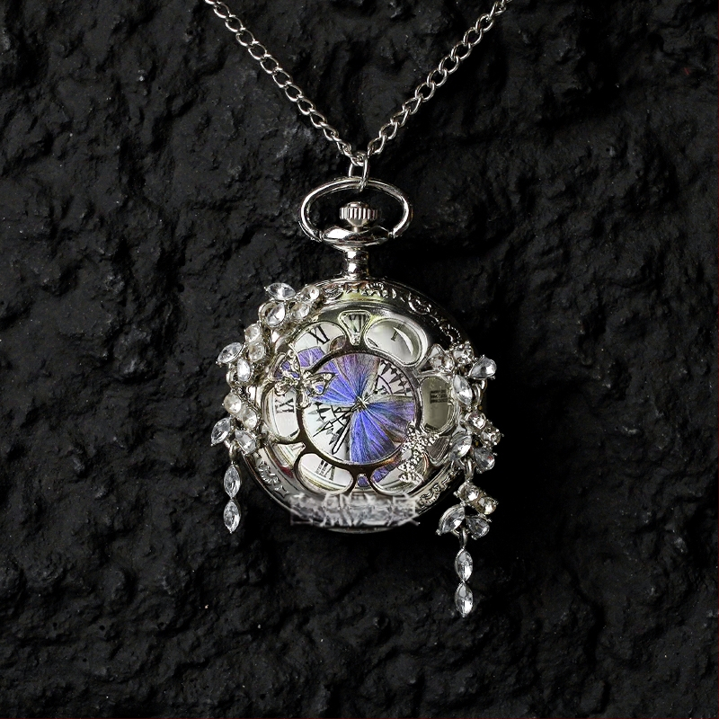 Liblika taskukell koos liikuva tegeliku liblika eksemplariga, ideaalne kingitus tüdrukutele ja sõbrannadele (Elektroniline mehhanism; veekindlus 35 m; silikoonkorpus; ümmargune kellapaneel; ABS klaas)