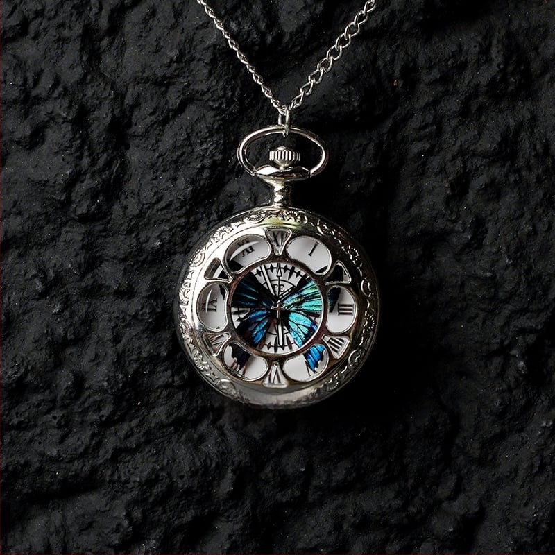 Liblika taskukell koos liikuva tegeliku liblika eksemplariga, ideaalne kingitus tüdrukutele ja sõbrannadele (Elektroniline mehhanism; veekindlus 35 m; silikoonkorpus; ümmargune kellapaneel; ABS klaas)