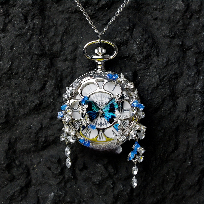 Liblika taskukell koos liikuva tegeliku liblika eksemplariga, ideaalne kingitus tüdrukutele ja sõbrannadele (Elektroniline mehhanism; veekindlus 35 m; silikoonkorpus; ümmargune kellapaneel; ABS klaas)