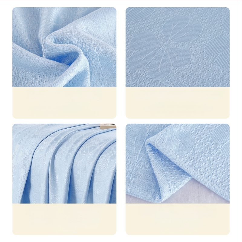 Bambuko pluošto pledas su džakardo raštu, šešialapio dobilo motyvas, šaldantis ledinės šilko audinys, visiems metų laikams